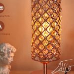 Hong-in Crystal Table Lamp in Rose Gold with elegant crystal detailing, glowing warmly on a modern desk or bedside table