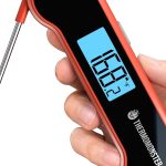Red instant read digital meat thermometer with waterproof design, auto-flip LCD, and ±0.5℉ accuracy for cooking and grilling