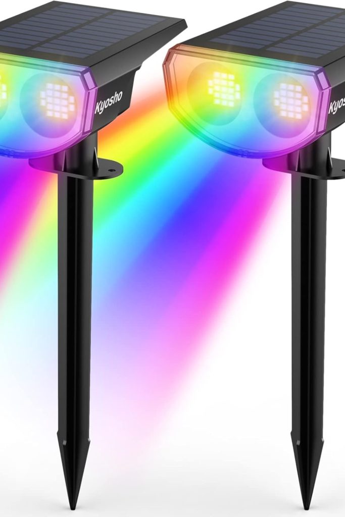 Kyosho RGBW solar color spotlights illuminating garden and trees