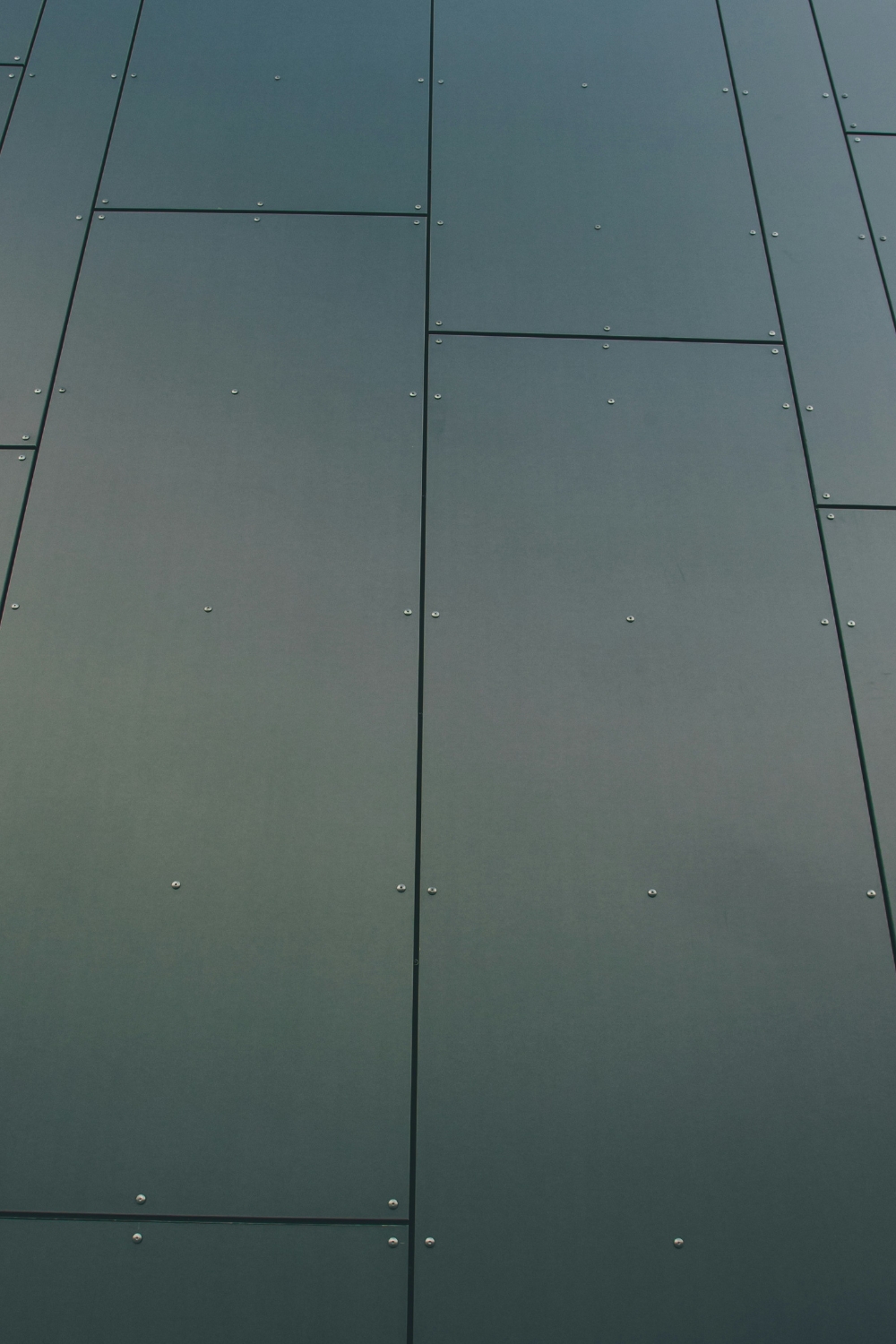 “Modern bedroom with mixed metal lighting fixtures”