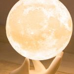 “Mydethun 3D moon lamp glowing with dual-color white and yellow light”