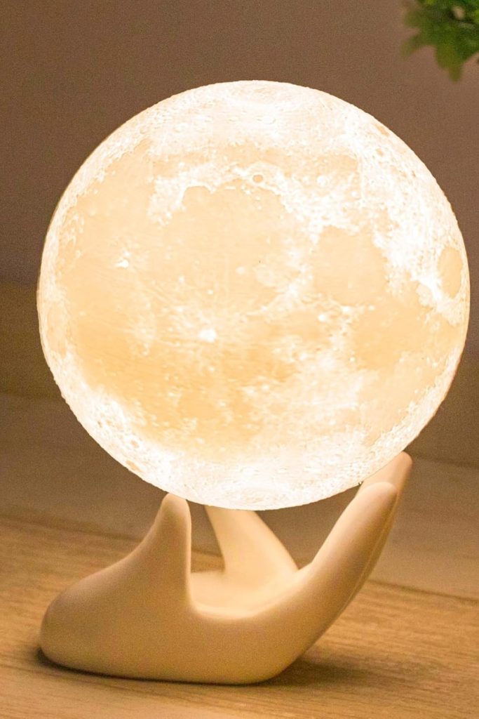 “Mydethun 3D moon lamp glowing with dual-color white and yellow light”