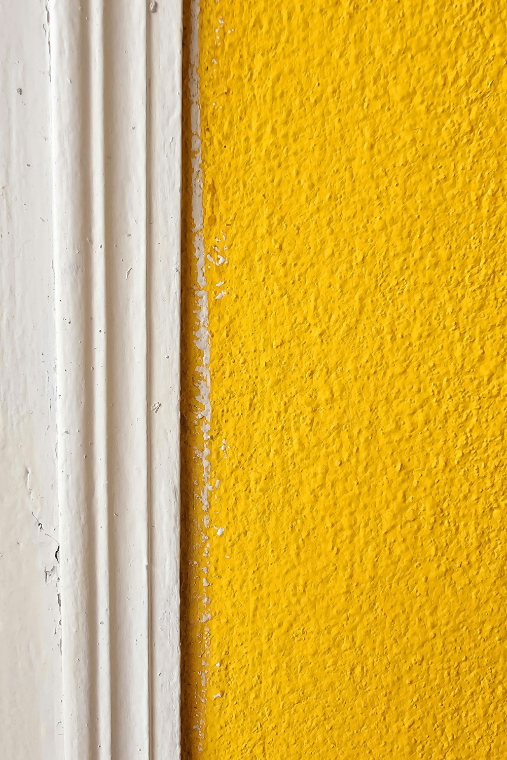 Living room before and after wall paint makeover