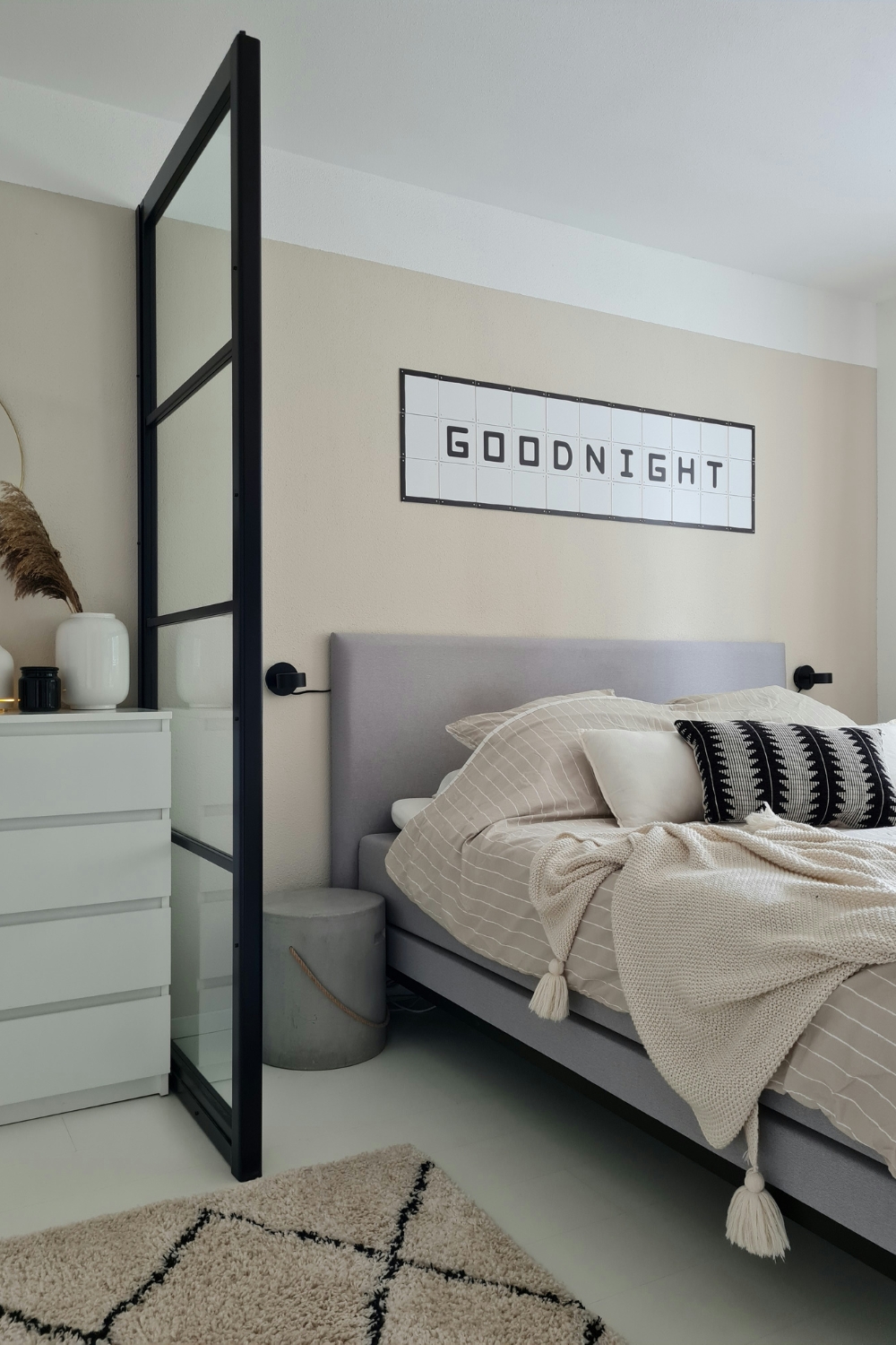 “Bold statement headboard in a modern bedroom”