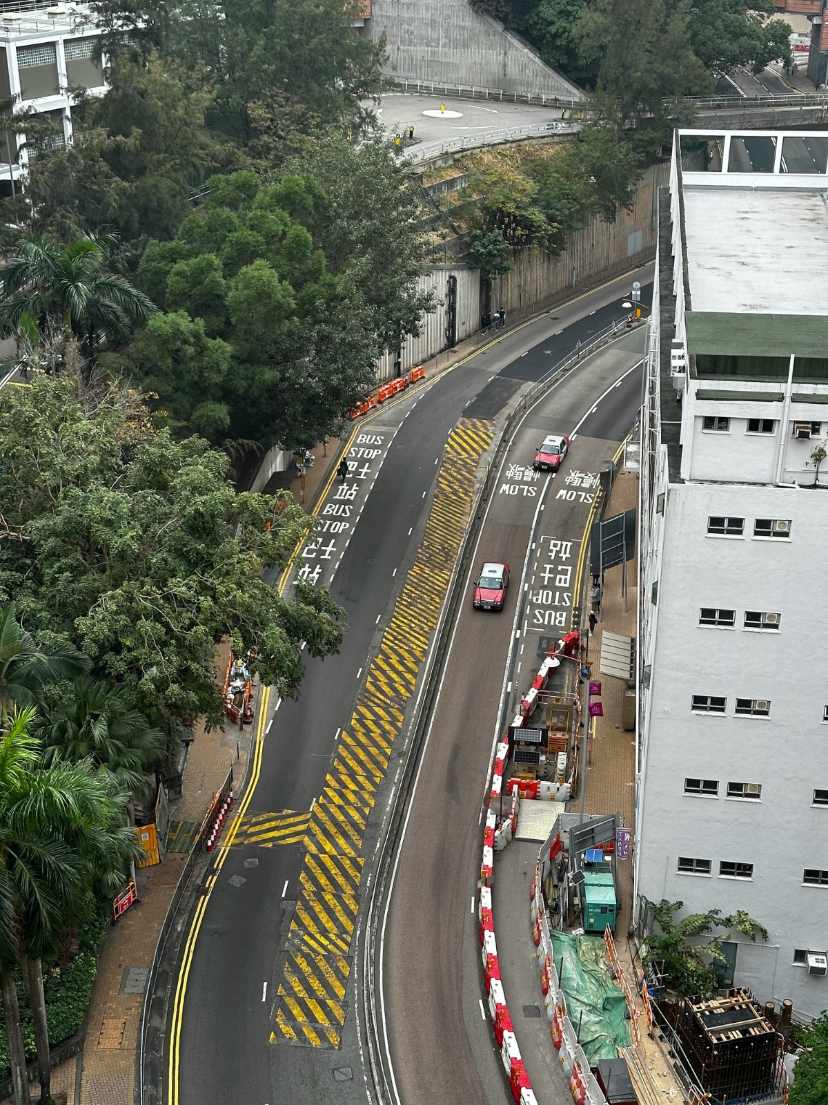 "Wiping kitchen countertop as part of daily cleaning routine"