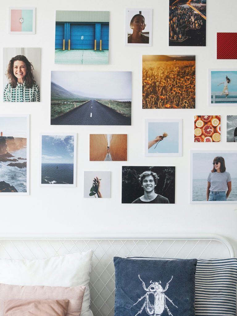 “Symmetrical wall art arrangement above sofa”