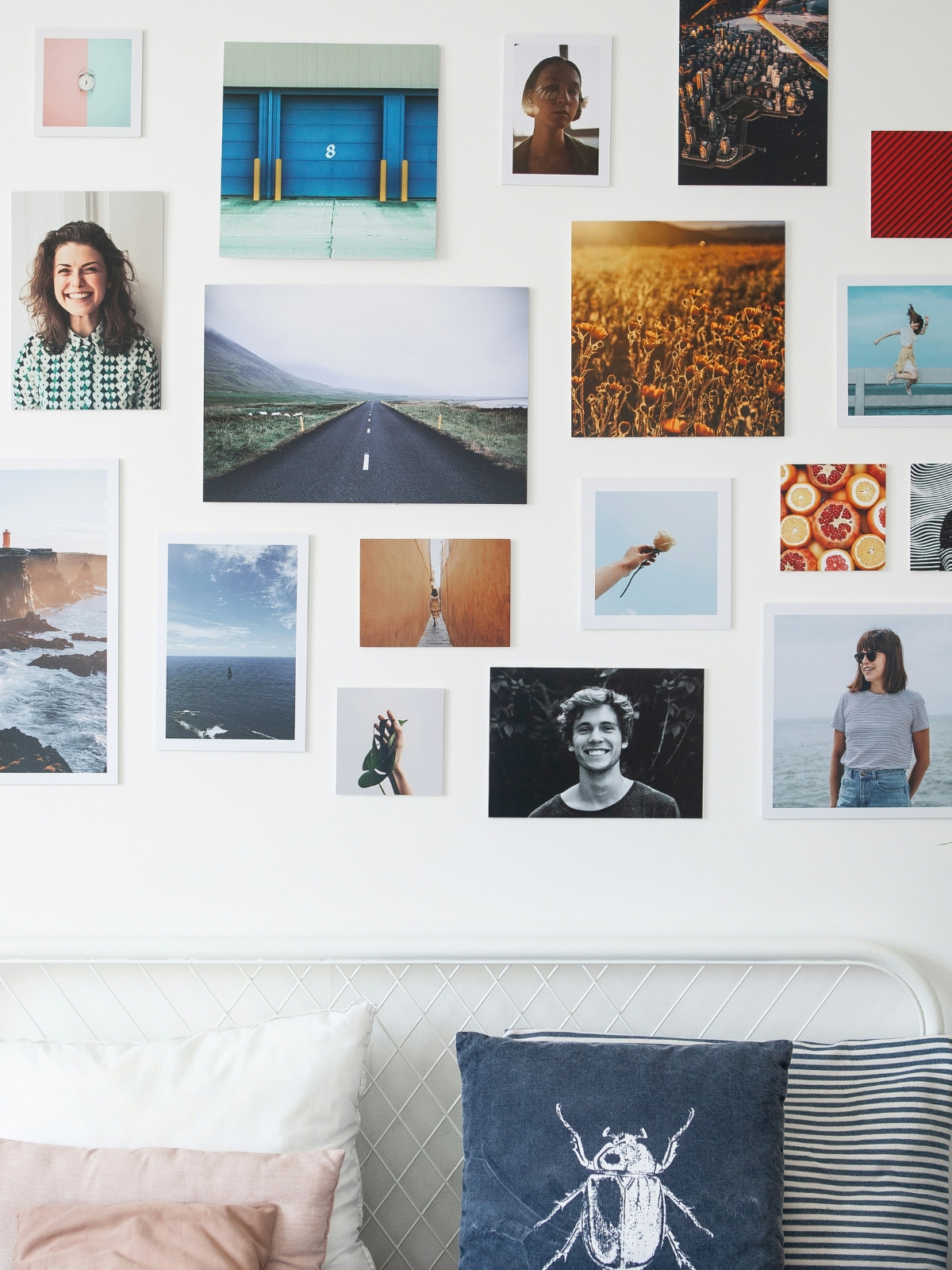 “Symmetrical wall art arrangement above sofa”