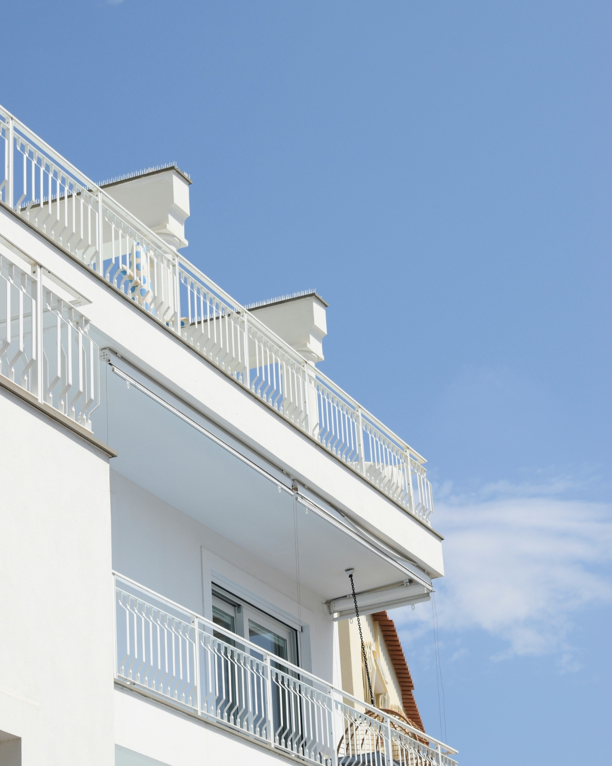 “Warm LED string lights illuminating a cozy balcony at night”