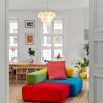 “White and beige color combination for small living room with natural light”