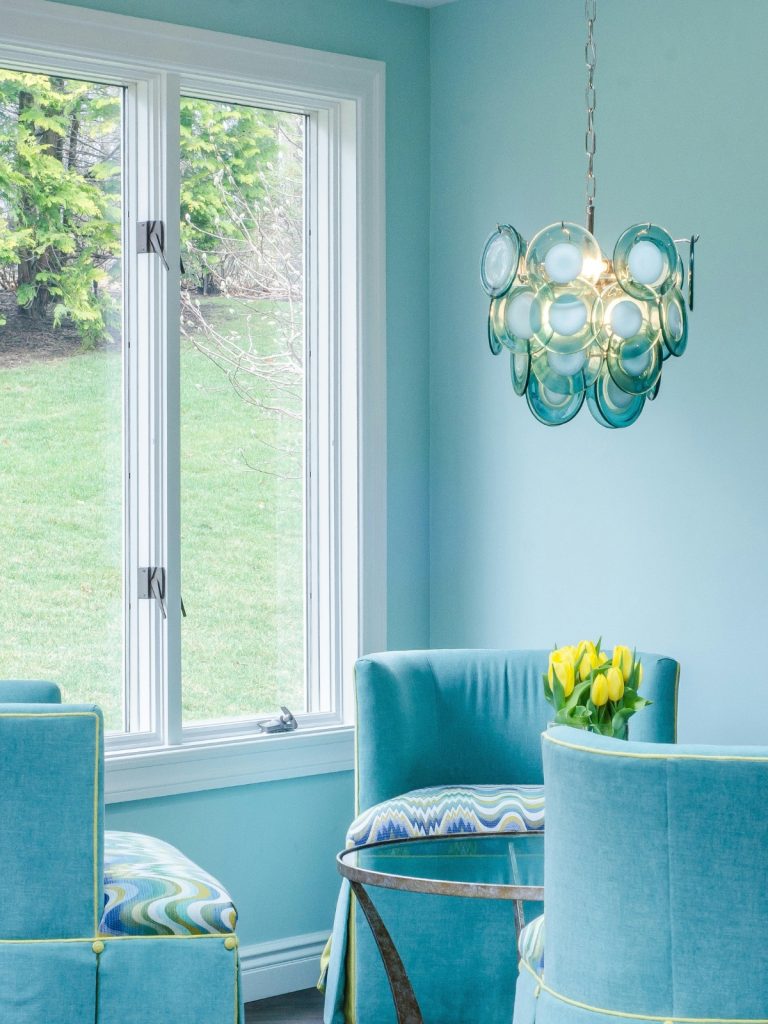 Soft blue bedroom walls with white bedding – best paint colors for a calm home