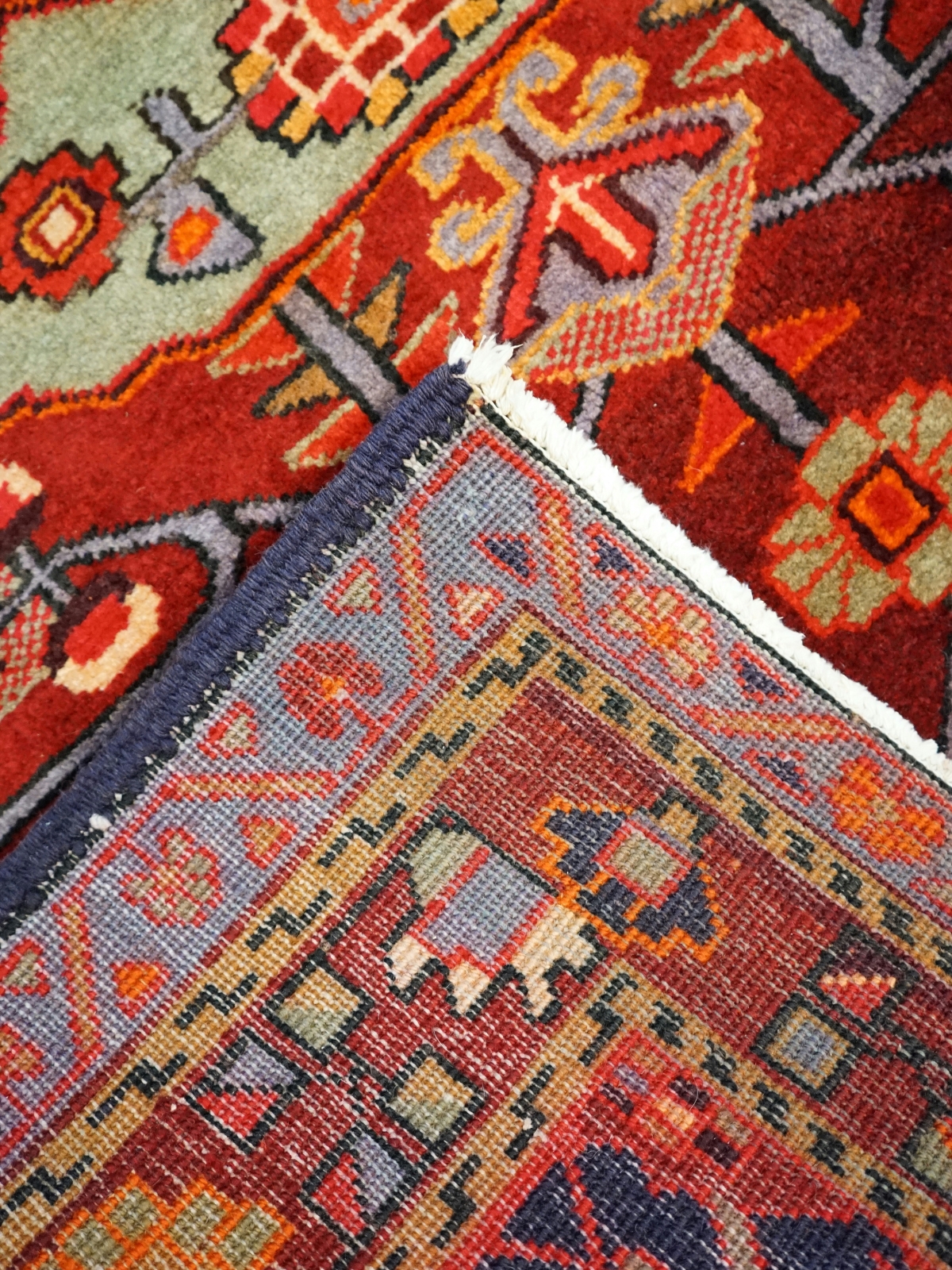 Living room with too small rug floating under furniture