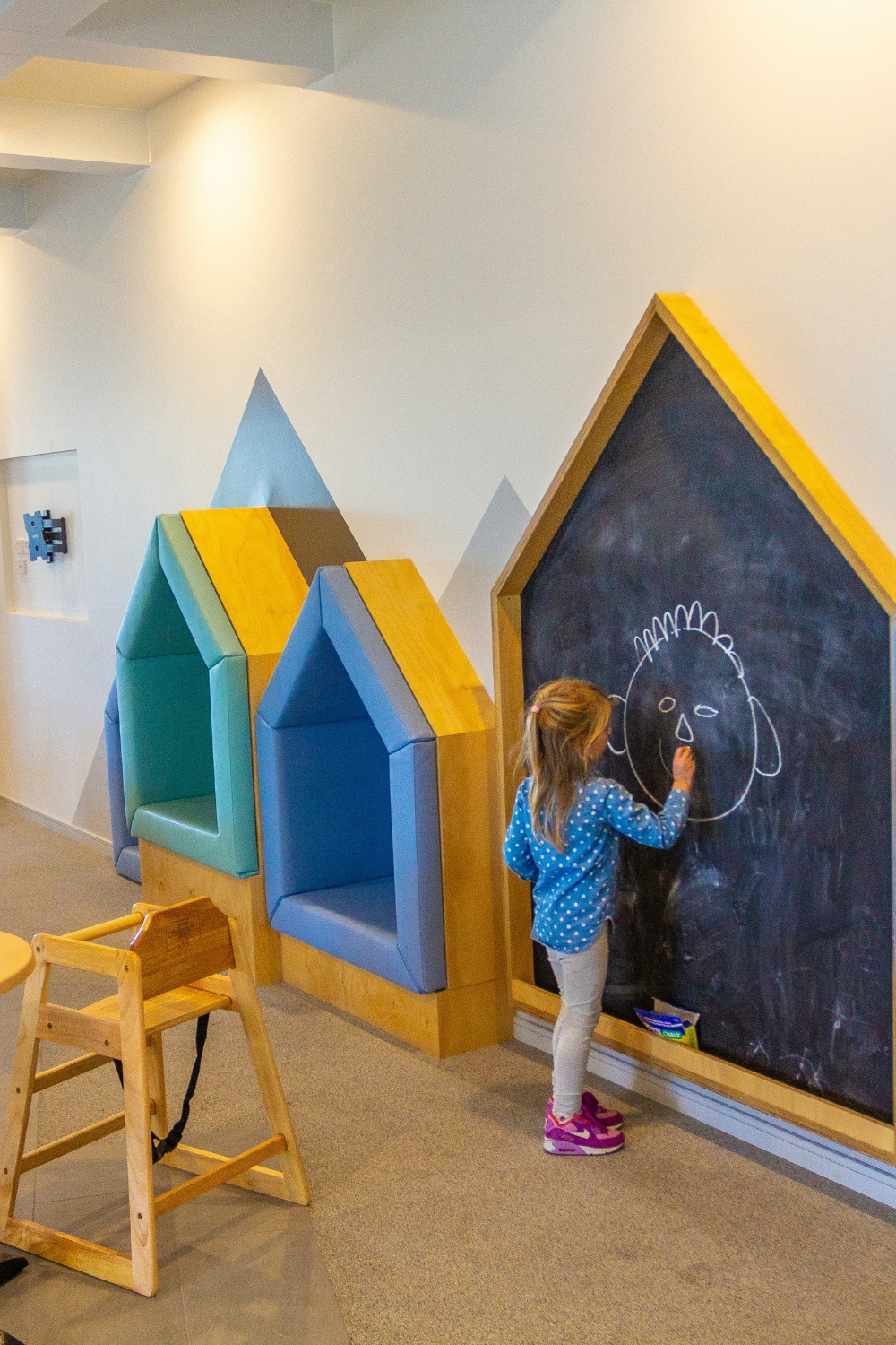 “Open living area with smart lighting zones for different activities”