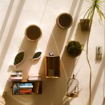 DIY glass bottle lamp using recycled materials with LED lights for eco-friendly home décor