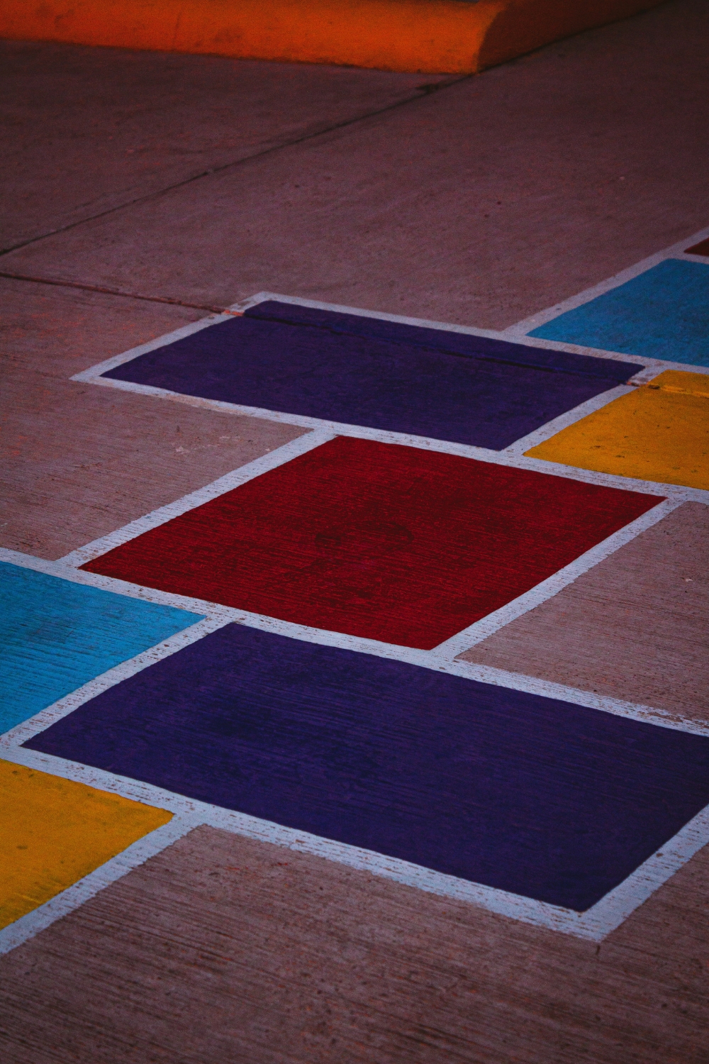 “Small balcony decorated with outdoor rug to define seating area”