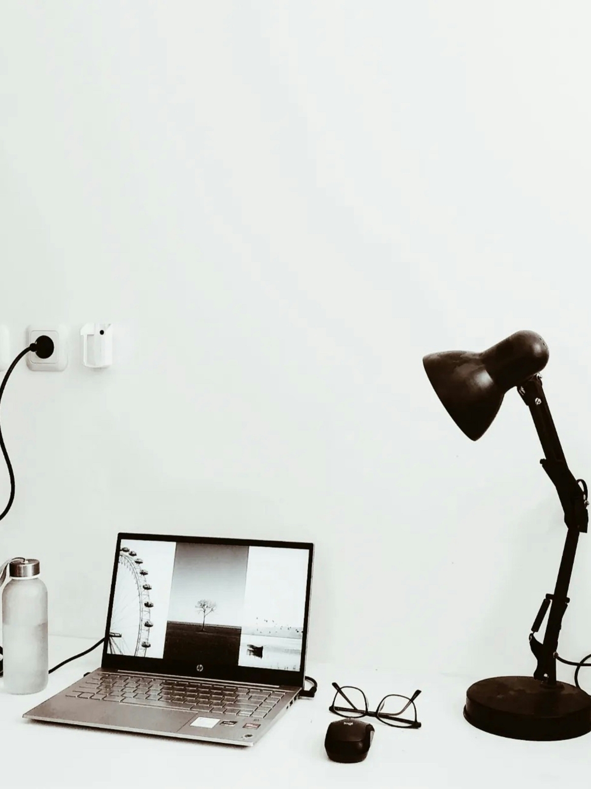 “Living room edited and simplified with minimal furniture for a cohesive, clean design.”