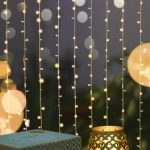 "Festive living room decorated with fairy lights and lanterns for Eid and Diwali 2025"