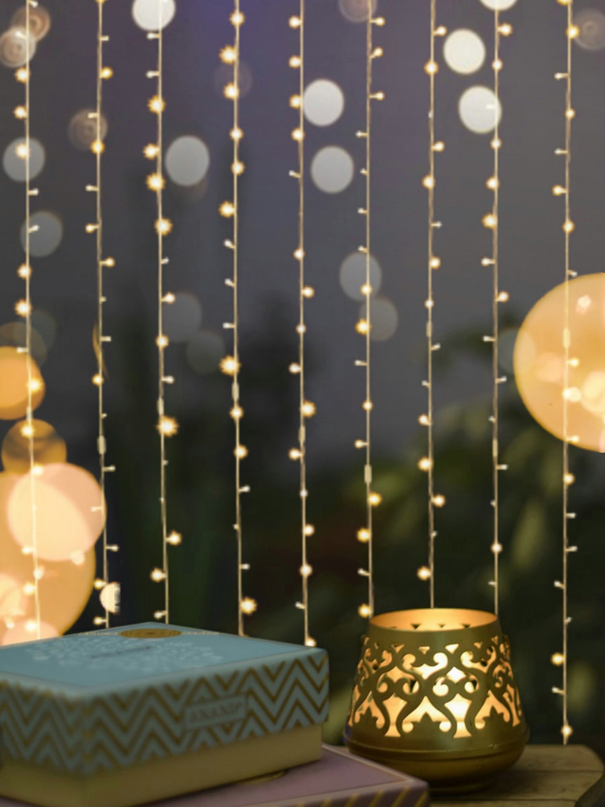 "Festive living room decorated with fairy lights and lanterns for Eid and Diwali 2025"