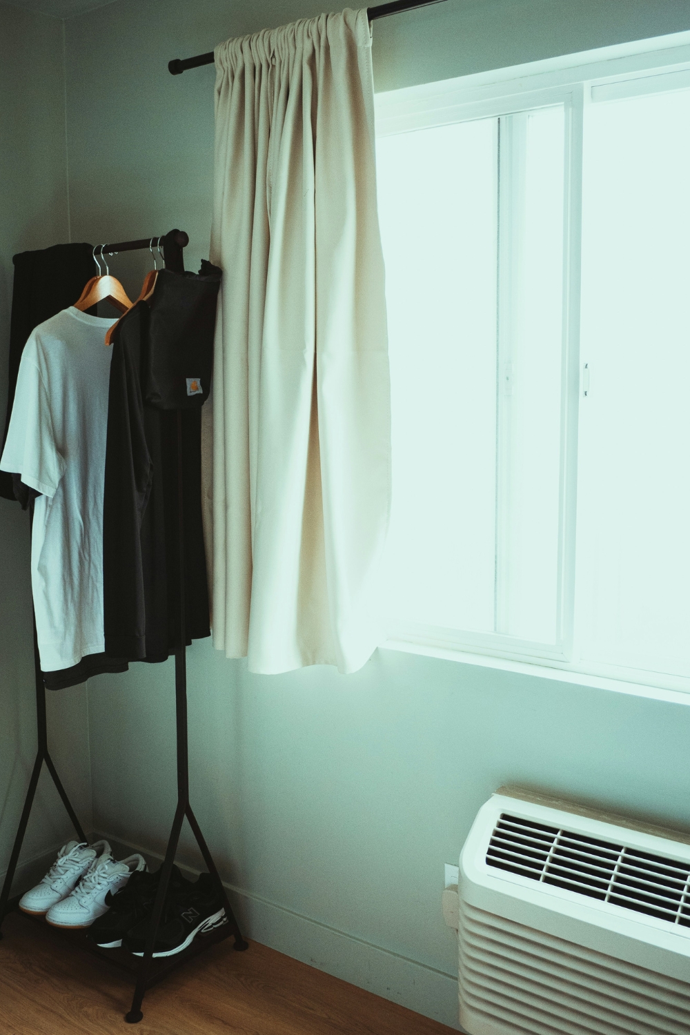 “Drying clothes indoors with natural airflow during monsoon”