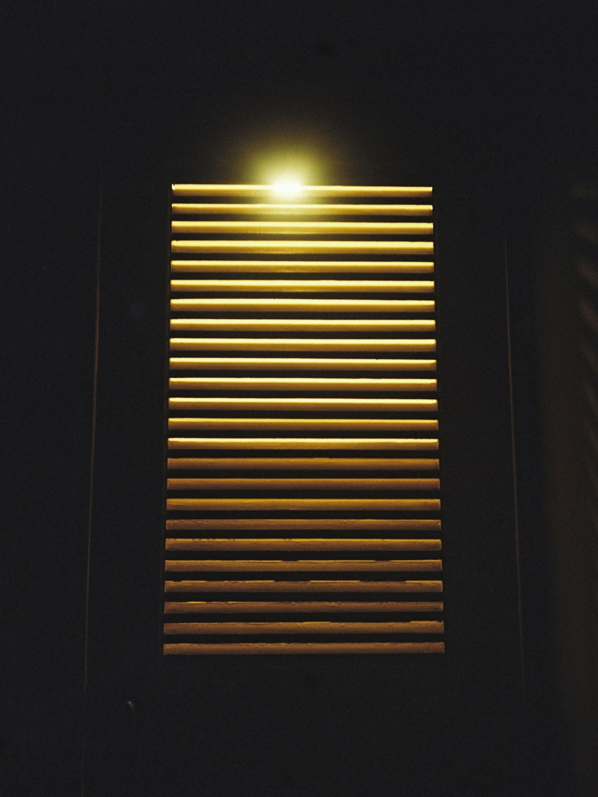 “Layered living room lighting with ambient and accent illumination for depth”