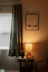“Home office desk near window using natural light for productivity”