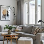 Living room with light-colored walls and small furniture – “Budget-friendly small living room decor with light colors and multi-functional furniture.”