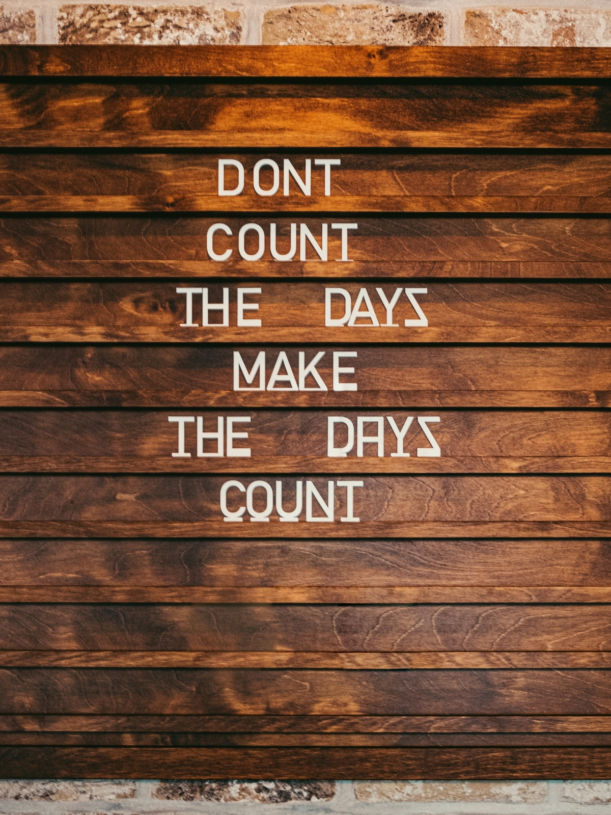 “Modern living room with a defined furniture foundation featuring a neutral sofa and wooden accents.”