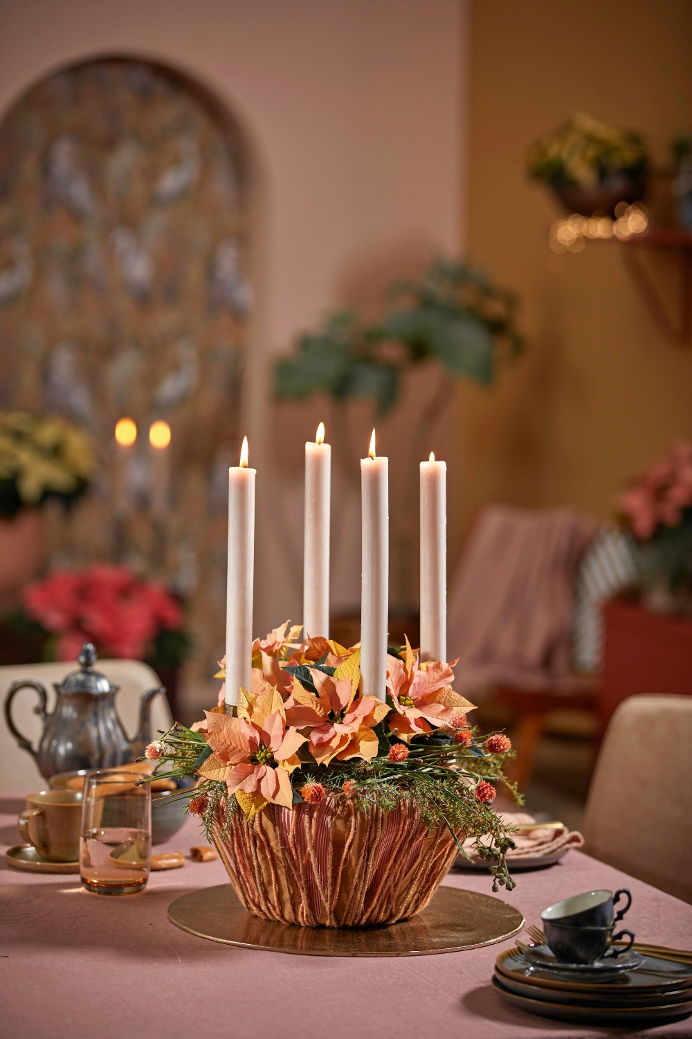 "Elegant table décor with candles, flowers, and fine dining setup for 2025"
