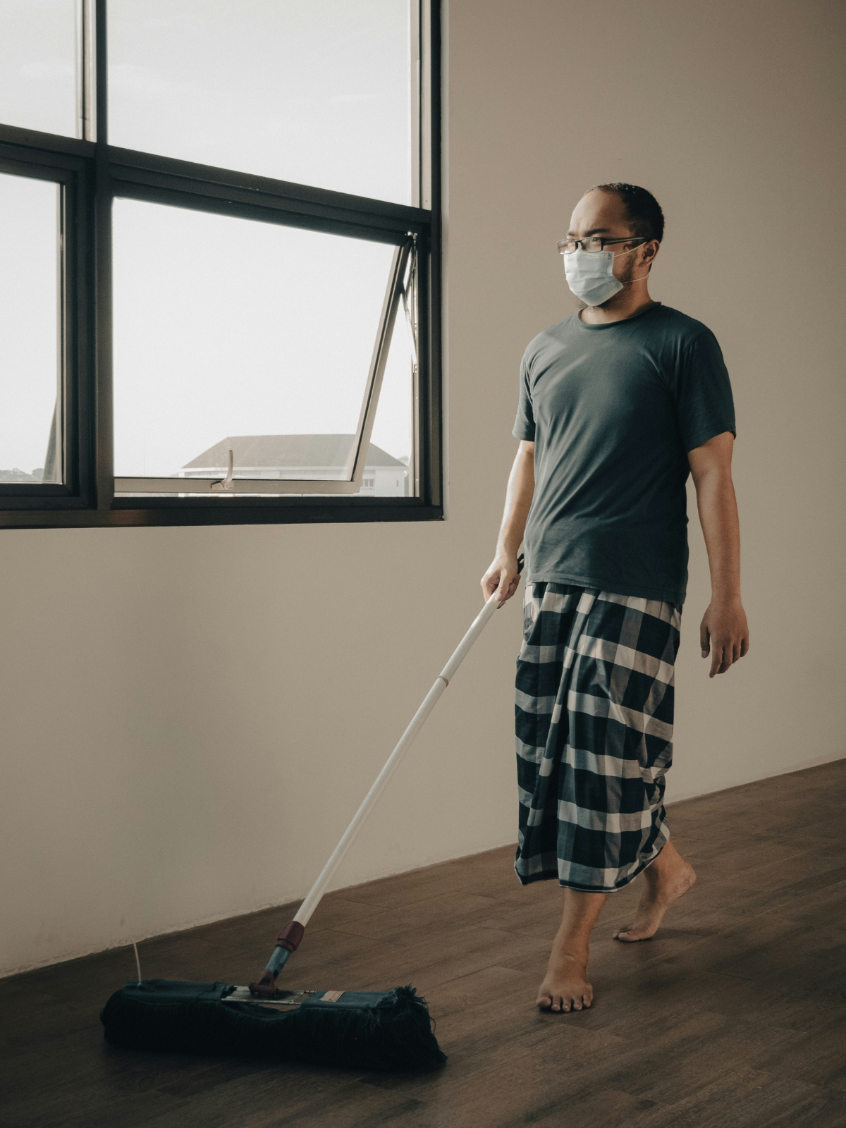 "Indoor plants getting natural light and ventilation during monsoon"