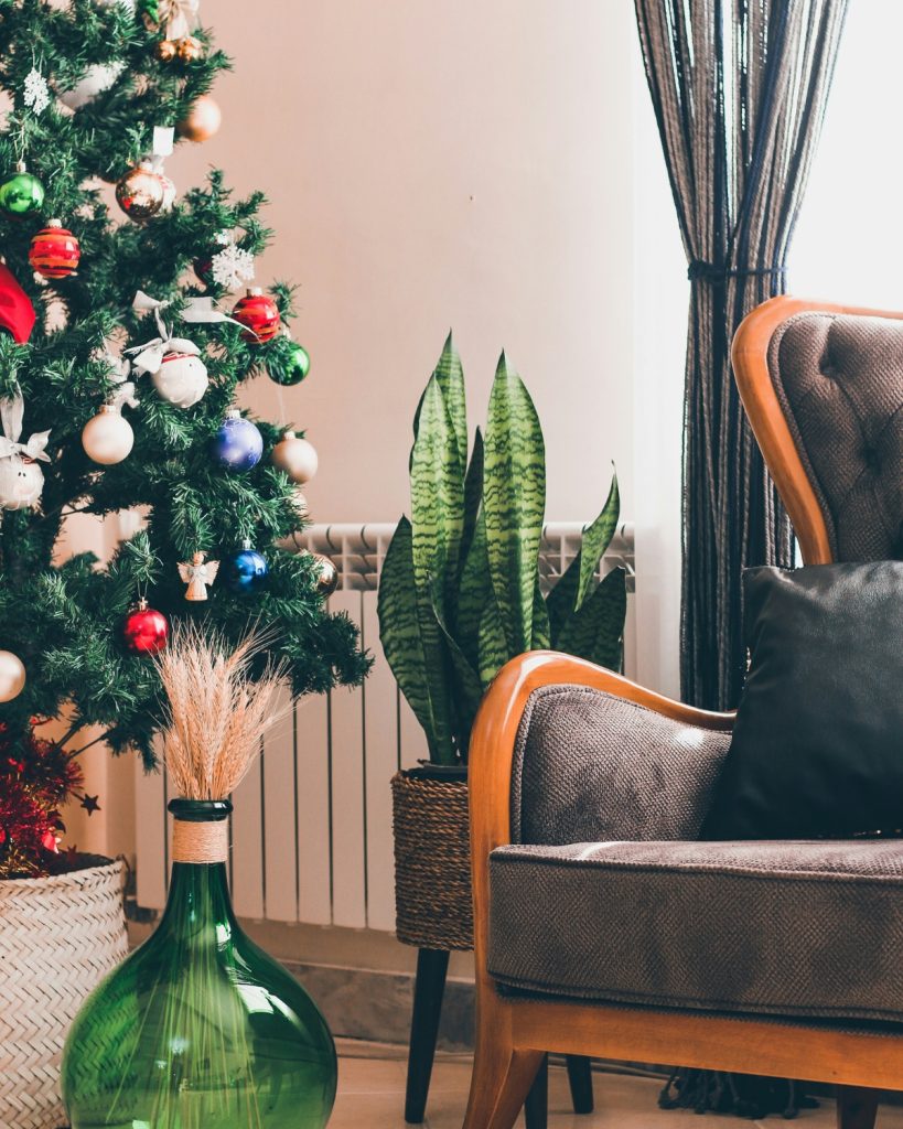 “Cozy living room decorated with warm LED lights and festive New Year theme in 2025.”