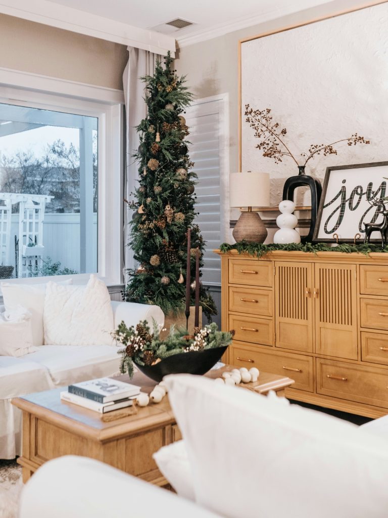 “Cozy living room with winter décor and warm lighting”
