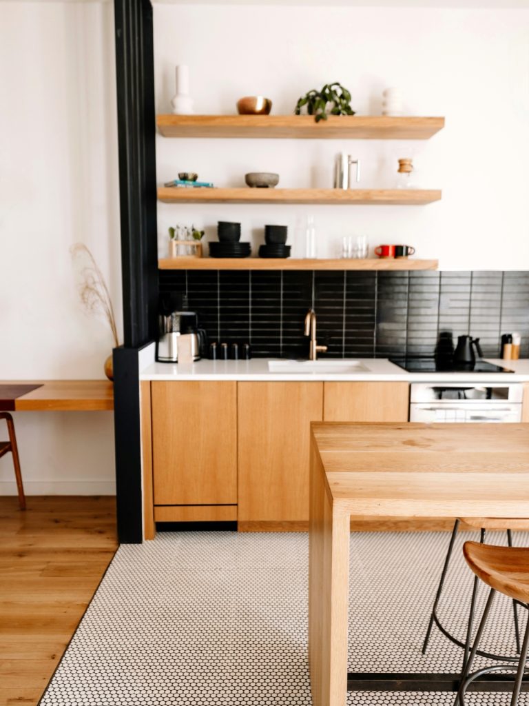 Affordable kitchen makeover under $20 with LED lighting and peel-and-stick backsplash