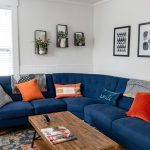 Budget-friendly living room decor upgrade with modern lighting and DIY wall art