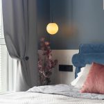 Calm bedroom atmosphere created with soft warm lighting and LED lamps