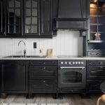 White subway tile kitchen backsplash with modern cabinets