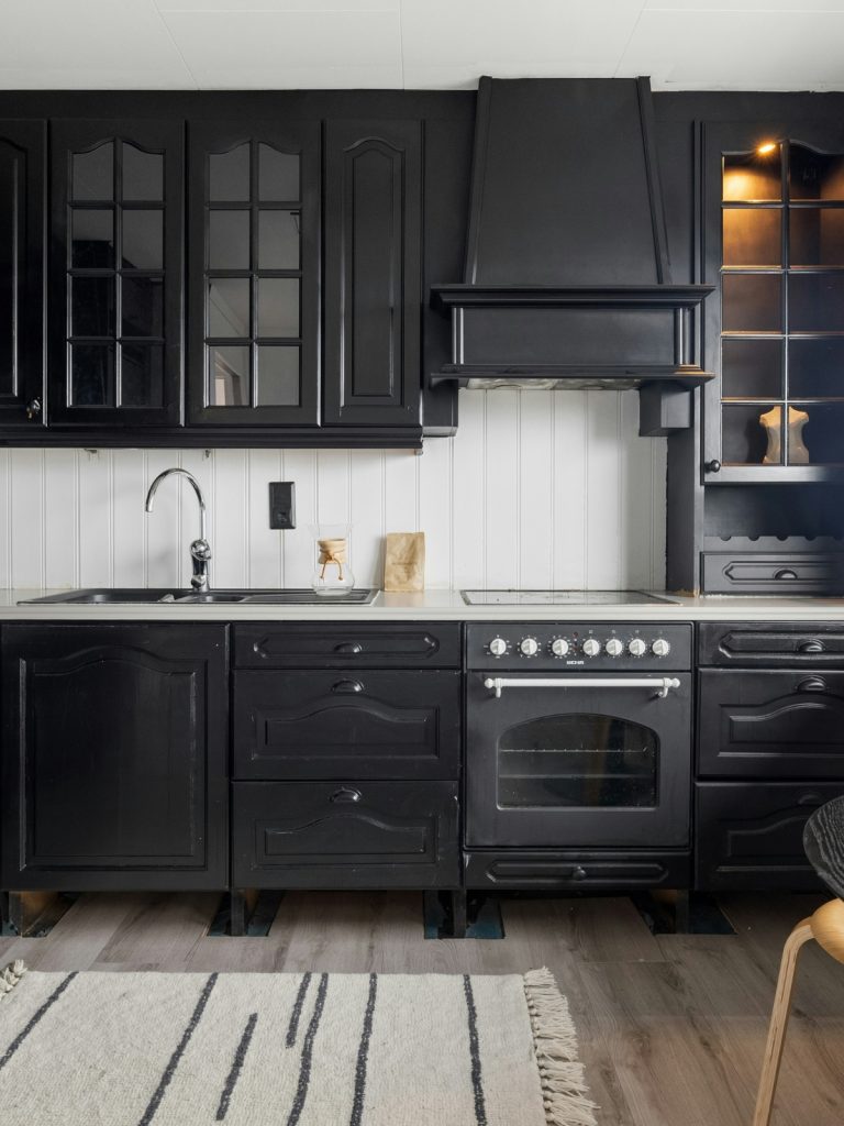 White subway tile kitchen backsplash with modern cabinets