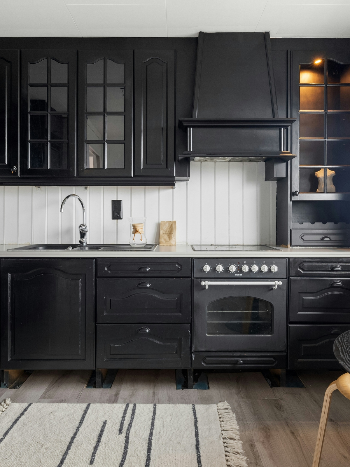 White subway tile kitchen backsplash with modern cabinets