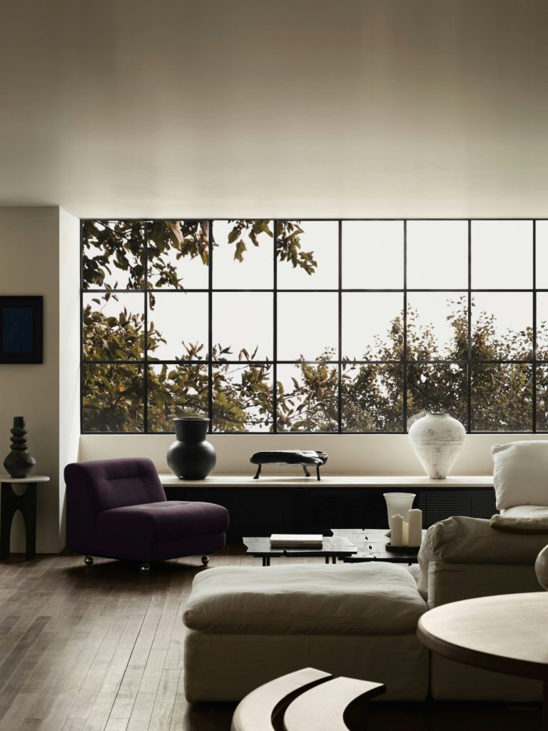 Modern minimalist living room with neutral colors and clean lines