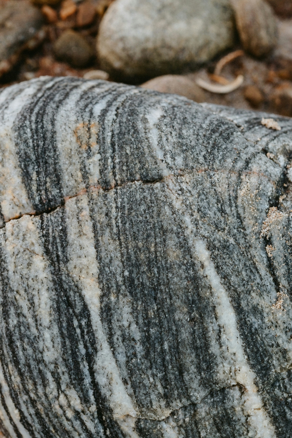 Polished white marble kitchen backsplash with gold faucet