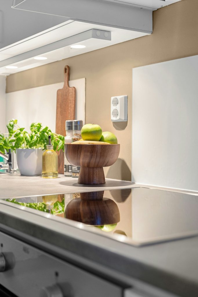 Compact kitchen with smart storage solutions and multifunctional island