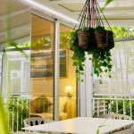 Realistic artificial greenery styled in a modern living room