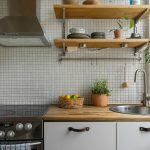 Minimalist white kitchen with clean countertops and modern lighting