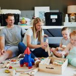 Living room childproofed with corner guards and soft lighting