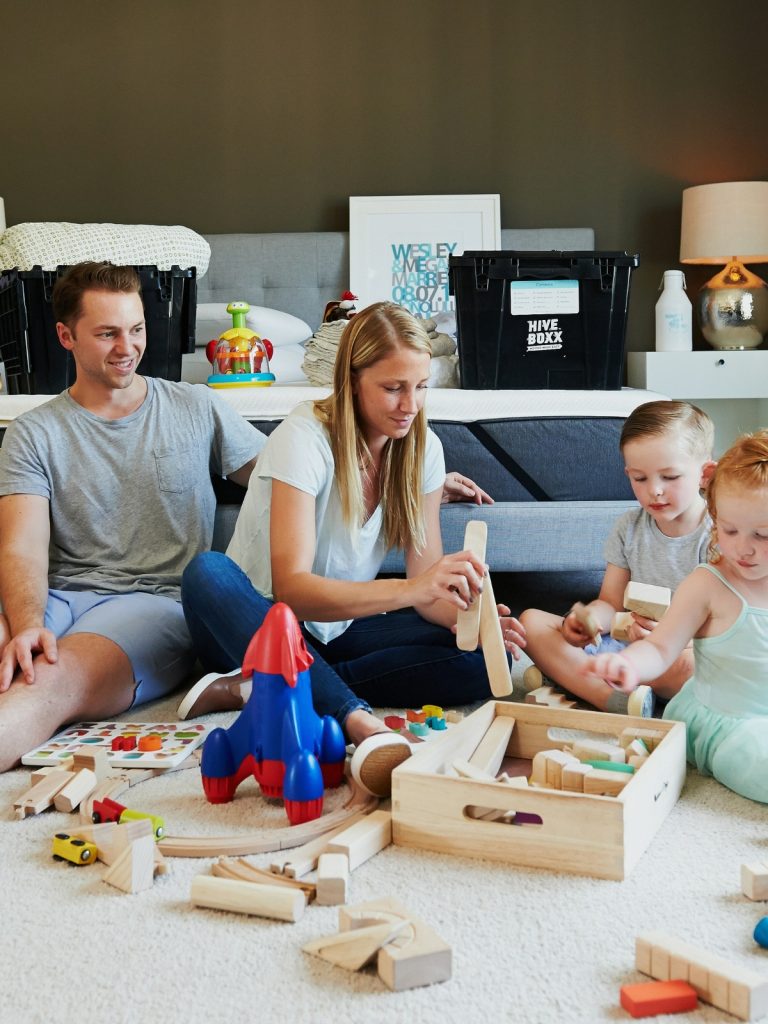 Living room childproofed with corner guards and soft lighting