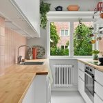 Eco-friendly kitchen decor ideas with bamboo cabinets and reclaimed wood shelves