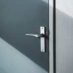 Modern door handle upgrade on wooden door