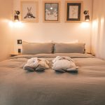 DIY fabric wall panel headboard created on a budget for a small bedroom