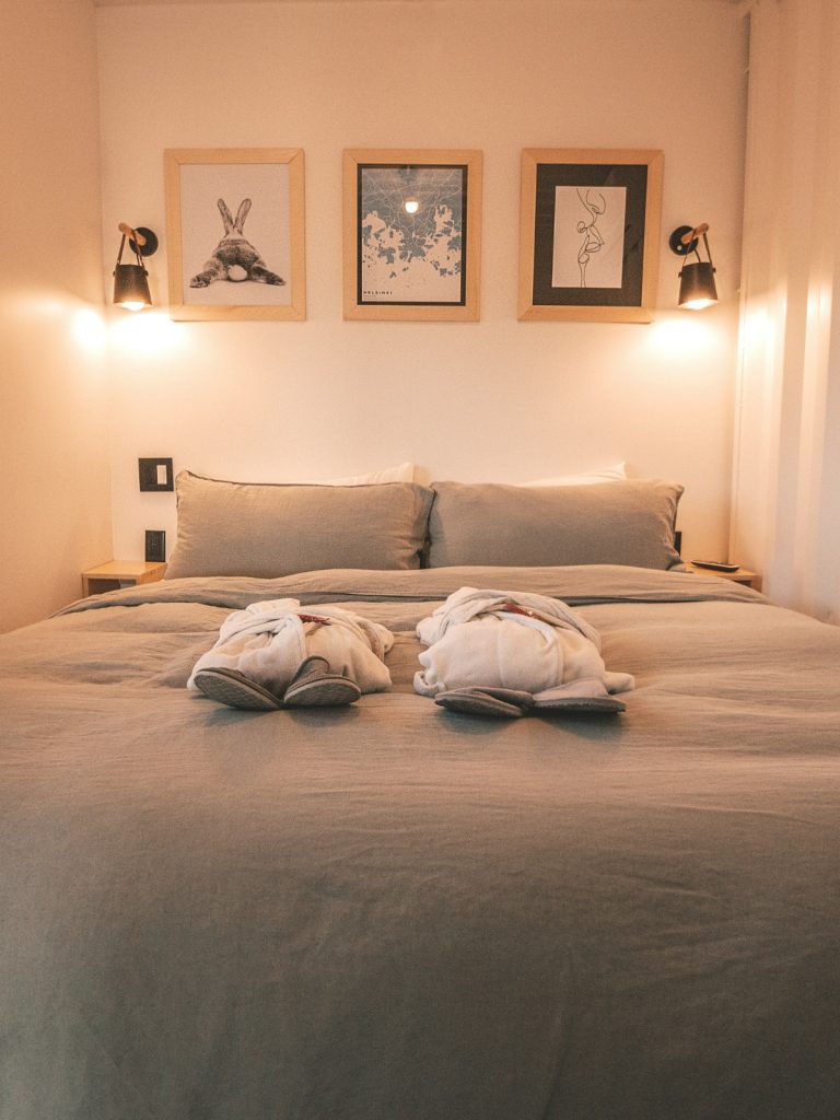 DIY fabric wall panel headboard created on a budget for a small bedroom