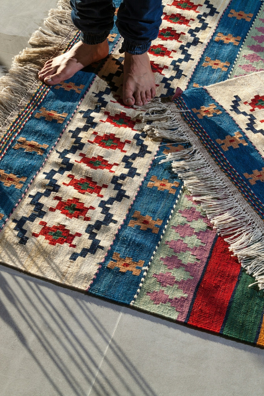 Correct rug size anchoring furniture in open-plan living area