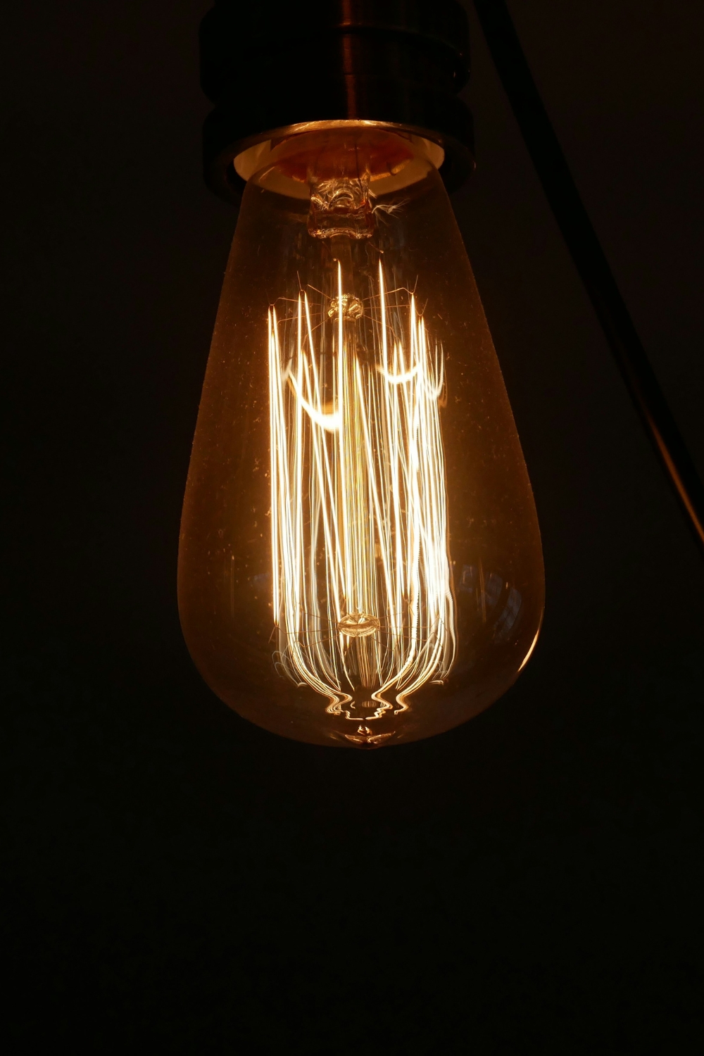 Luxury hotel-style living room featuring a large statement chandelier