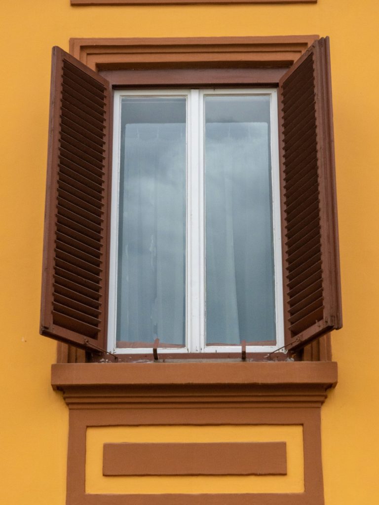 Modern living room with layered curtains designed for privacy